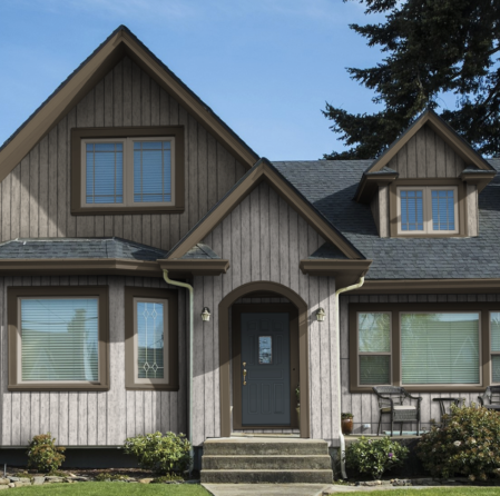 Home with vertical fibre-cement board-and-batten siding